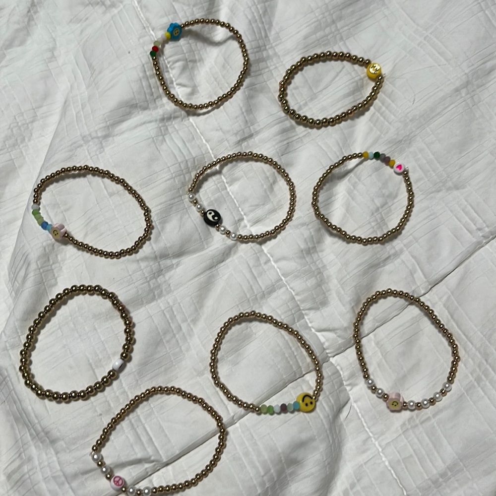 Gold Bracelet set. 9 bracelets hand made. Very strechy